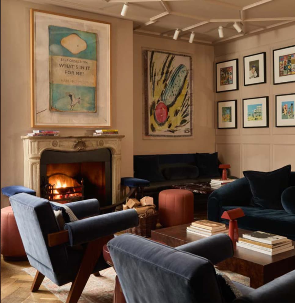 Art-filled living room with fireplace